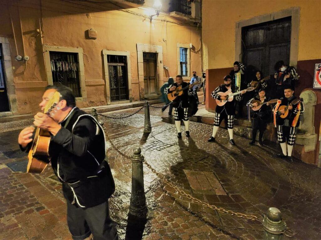 A group of people dressed in Renaissance clothes playing music.