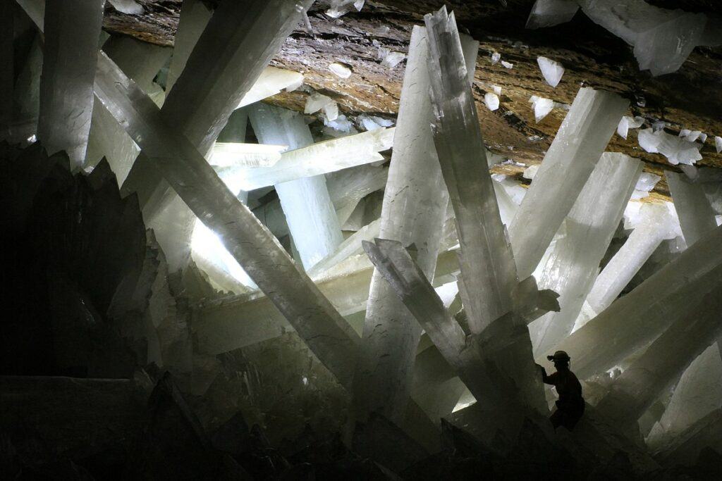 A cave filled with white crystals.