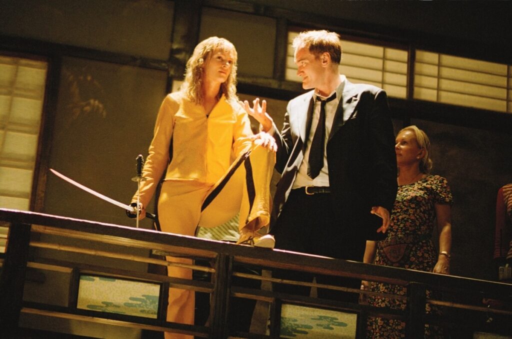 Kill Bill Vol. 2 Uma Thurman and Quentin Tarantino in the set of Kill Bill.