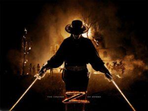 The Mask of Zorro Zorro holding two swords and fire behind him.