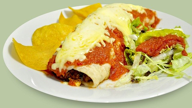 Enchiladas with lots of cheese.