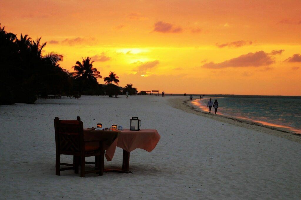 A table set for dinner during sunset.