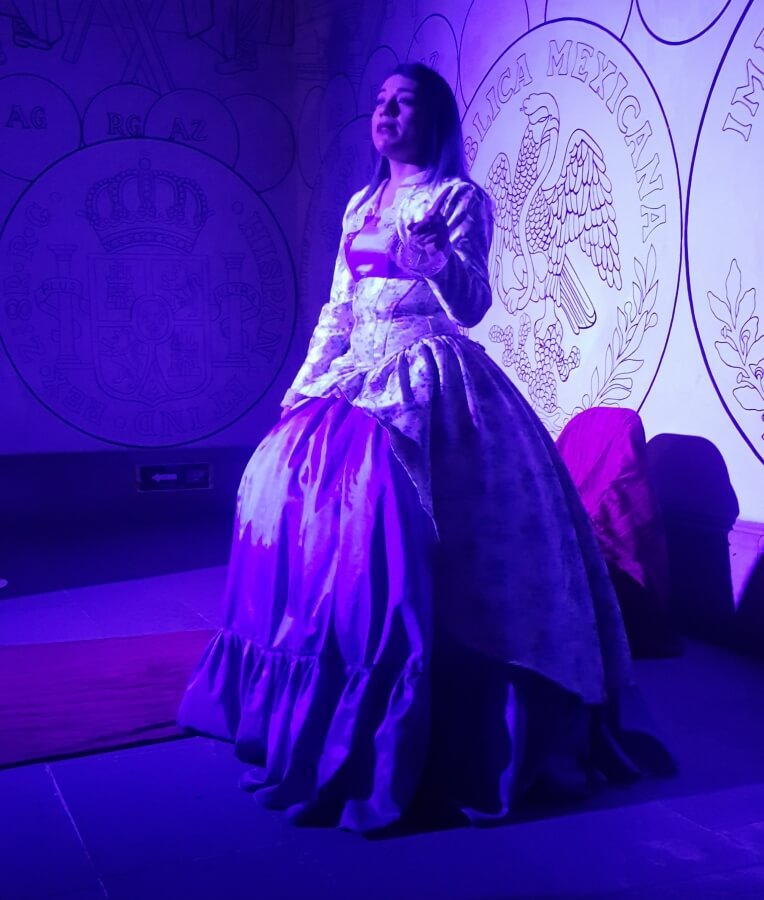 Actress dressed up as a princess.