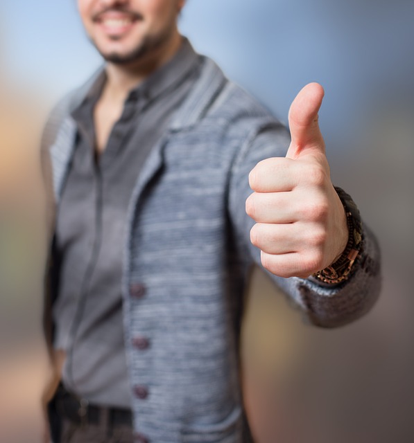 A man giving a thumbs up.
