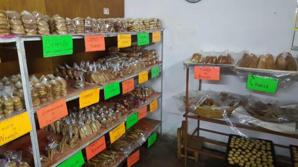 Shelves with bread at a bakery.