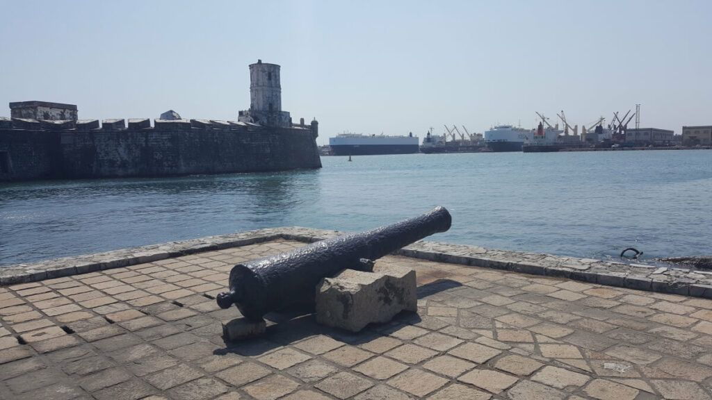 A cannon by a former fortress in the sea.