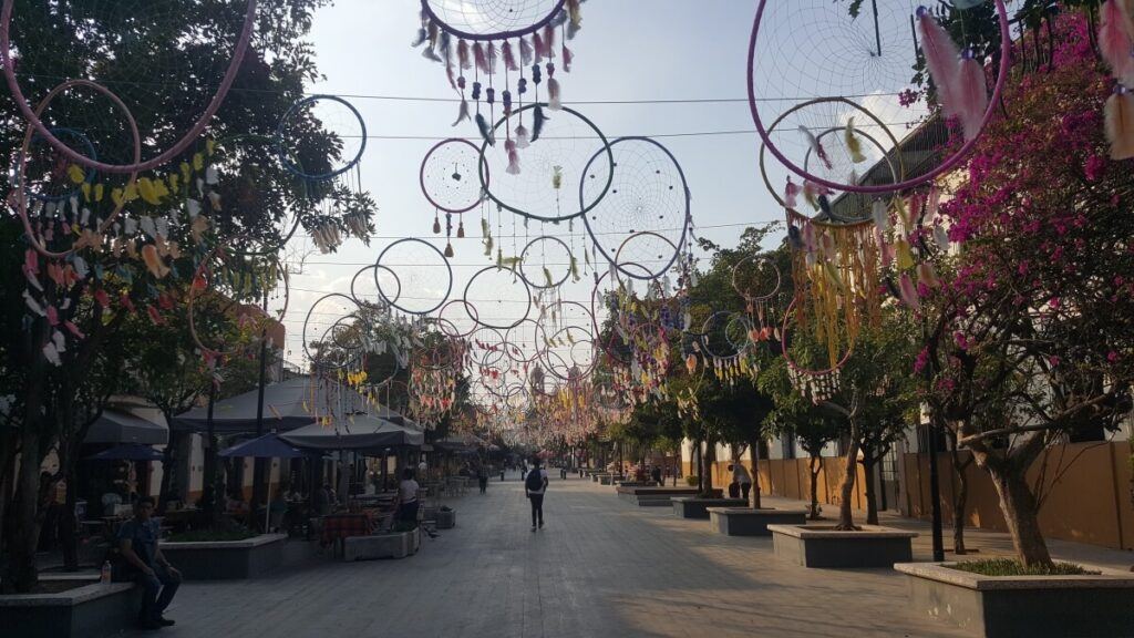 Tourist corridor with dreamcatchers hanging.